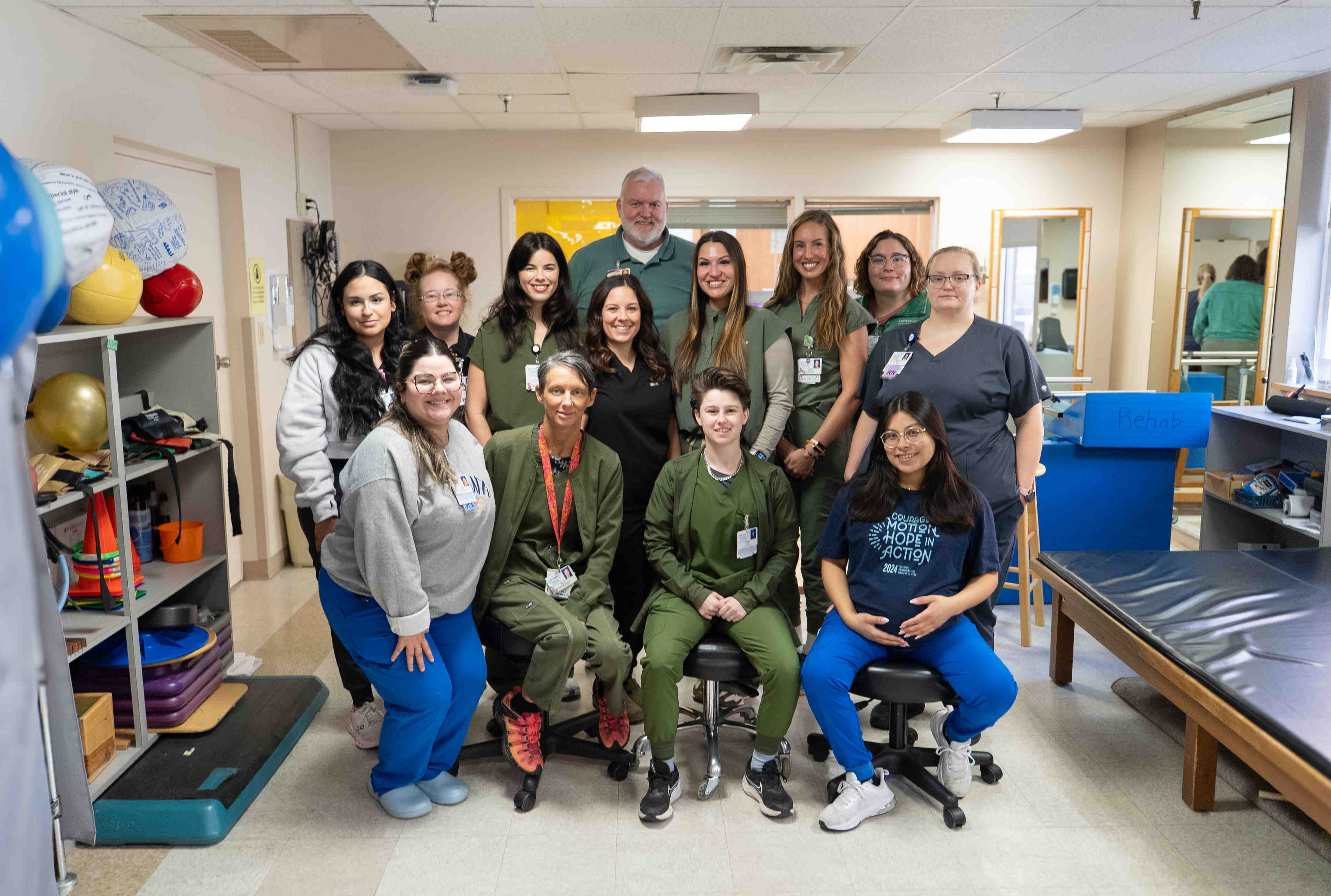 Saint Mary’s rehabilitation team gathers for a group photo in the rehab unit.