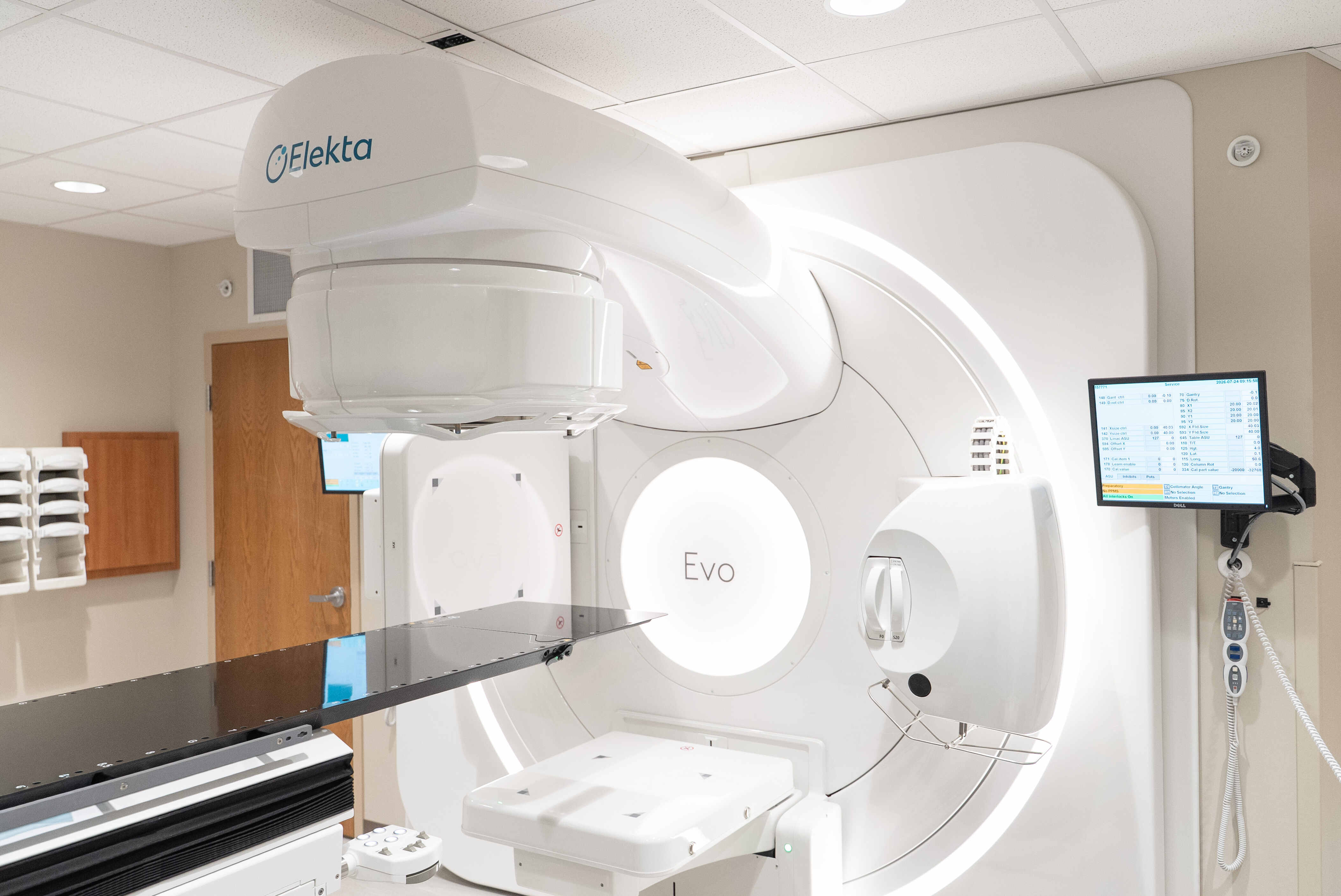 Elekta Evo radiation therapy system inside a treatment room at Saint Mary's Cancer Center. The advanced linear accelerator features integrated imaging and a patient treatment table used to deliver precise radiation therapy